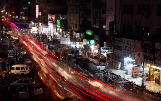 A busy street in Karachi June 29, 2013. Since Pakistan's biggest electricity company was privatised, its headquarters have been looted, its employees kidnapped and the government tried to arrest its boss. It's been a roaring success. Power cuts lasting 12 hours a day or more have devastated Pakistan's economy. The only city bucking the trend is the violent megacity of Karachi, Pakistan's financial heart - thanks to Tabish Gauhar and his team at the Karachi Electricity Supply Company (KESC).