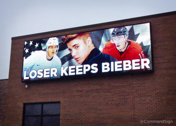 Image: A Command Transportation billboard in Skokie, Ill., proposes, in jest, the loser of the Olympics mens hockey final keeps Justin Bieber.