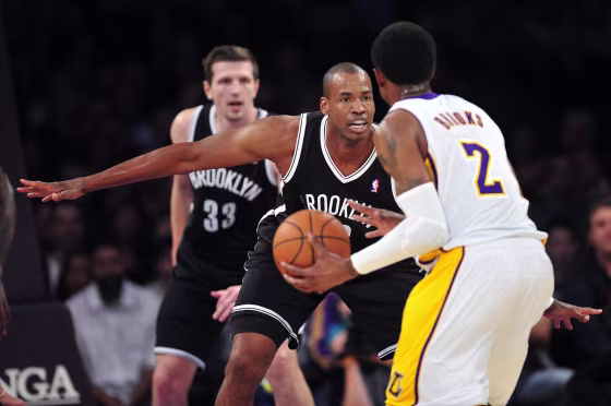  Brooklyn Nets center Jason Collins (46) defends against Los Angeles Lakers shooting guard MarShon Brooks (2) during the first half at Staples Center. 