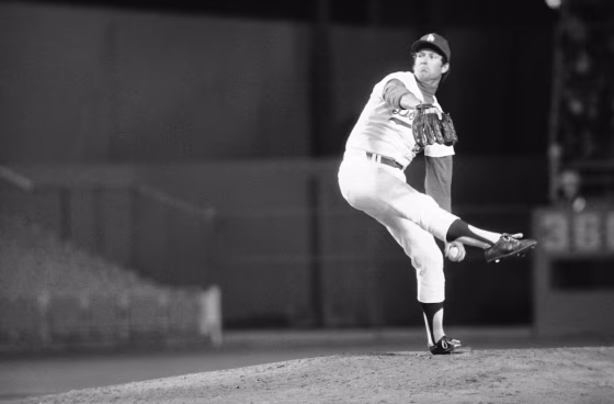 The Dodgers’ Tommy John, whose throwing arm was repaired in a radical operation in 1974, pitches his first victory since July 1974, as he downed Pittsburgh on April 29, 1976 in Los Angeles.