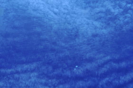 Suspicious objects are seen from a Chinese IL-76 search plane over the southern Indian Ocean, March 24, 2014.