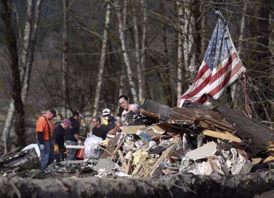 A large number of volunteers turned out Monday March 24, 2014, wanting to help with the search in Oso, Washington. (AP Photo /The Herald, Dan Bates)