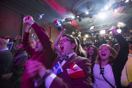 Image: Parti Liberal Québécois supporters celebrate victory in Montreal.