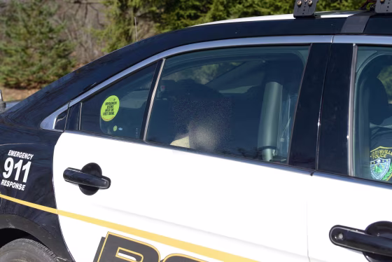 A suspect in the Franklin Regional High School stabbings leaves the Murrysville Police Station on April 9, 2014. Image blurred to protect identity.