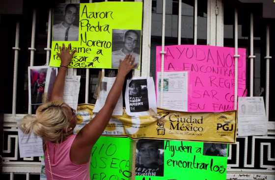 Image: Photos of recently disappeared relatives are posted in Mexico City on May 30, 2013.