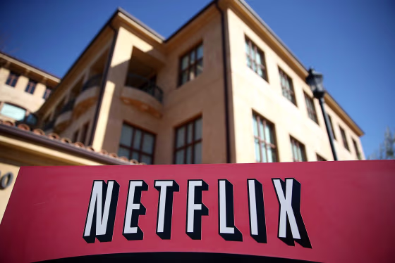 Image: A sign is posted in front of the Netflix headquarters