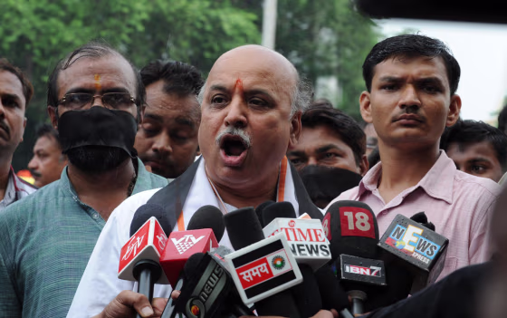 Vishwa Hindu Parishad (VHP) acting president, Pravin Togadia addresses media representatives ahead of a rally in Ahmedabad in September, 2012. Togadia and hundreds of VHP supporters participated in a the rally in support of those convicted in Naroda Patiya case in which some 97 Muslims were burnt alive in the 2002 Gujarat Riots. 