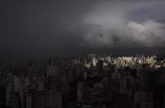 Image: Rain clouds gather over the city of Sao Paulo