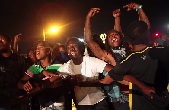 Image: Protestors defy police, take to the streets of Ferguson