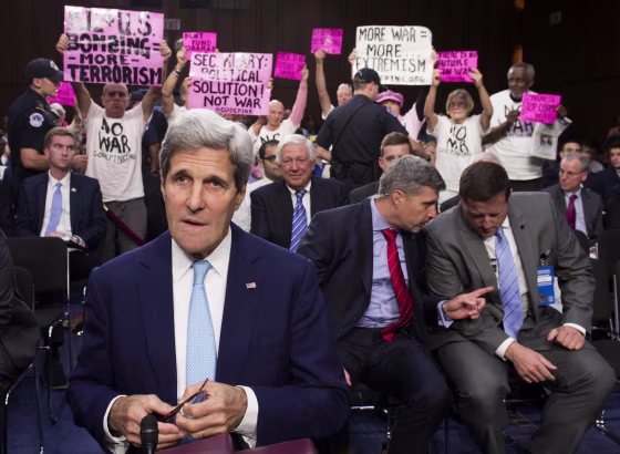 Image: Protesters Interrupt Kerry Senate Hearing on ISIS