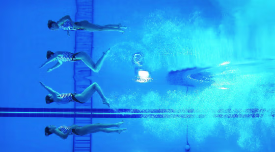 Image: Japan's Inui and Mitsui perform in the women's duet technical routine synchronised swimming competition during the 17th Asian Games in Incheon