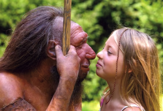 Image: Girl and Neanderthal statue