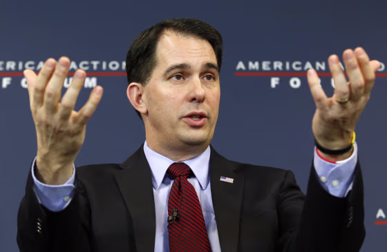 Wisconsin Governor Scott Walker (R-WI) participates in a panel discussion at the American Action Forum in Washington, in this January 30, 2015 file photo. When Walker, a potential Republican presidential candidate, travelled on a trade mission to Britain last week, he brought along top officials from his economic development agency to help drum up jobs. It's a task they have struggled to accomplish at home.   REUTERS/Yuri Gripas/Files (UNITED STATES - Tags: POLITICS)
