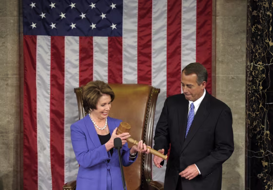 House Minority Leader Nancy Pelosi of Calif. passes the gavel to House Speaker John Boehner of Ohio, who was re-elected as House Speaker of the 113th Congress, Thursday, Jan. 3, 2013, on Capitol Hill in Washington. (AP Photo/Susan Walsh)