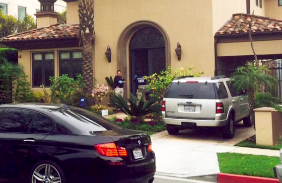 ICE agents search a house in Beverly Hills, California on March 11, 2015.