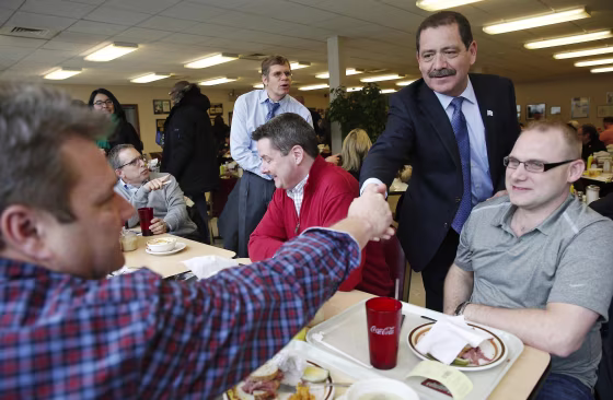Image: File photo of Chicago Mayoral candidate Jesus \"Chuy\" Garcia greeting restaurant patrons, during a campaign stop on election day in Chicago