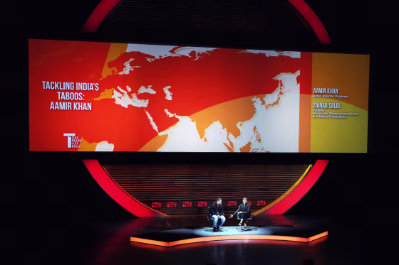 Image: Actor Aamir Khan, left, and author Zainab Salbi appear onstage during the 2015 Women In World Summit.
