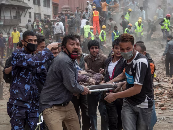  Emergency rescue workers carry a victim on a stretcher after Dharara tower collapsed on April 25,  in Kathmandu, Nepal.  Hundreds have died as tremors hit Nepal after an earthquake measuring 7.9 on the Richter scale caused buildings to collapse and avalanches to be triggered in the Himalayas.