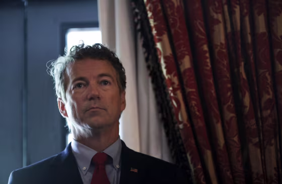 Image: Republican presidential candidate Senator Rand Paul (R-KY) waits before addressing a legislative luncheon held as part of the \"Road to Majority\" conference in Washington
