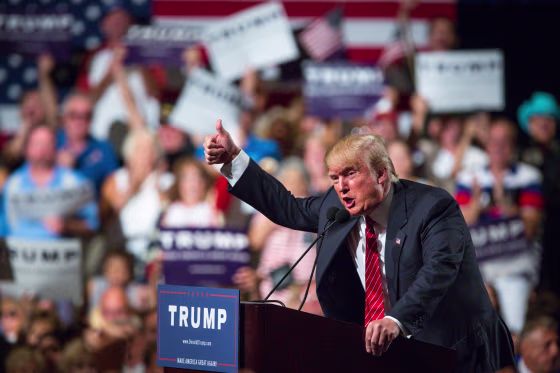 Republican Presidential candidate Donald Trump addresses supporters during a political rally at the Phoenix Convention Center on July 11, 2015.