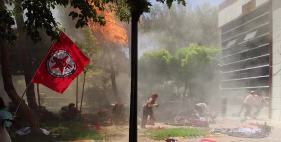 Image: The scene after an explosion in the town of Suruc