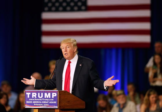 Image: Donald Trump speaks during a rally in Dubuque,