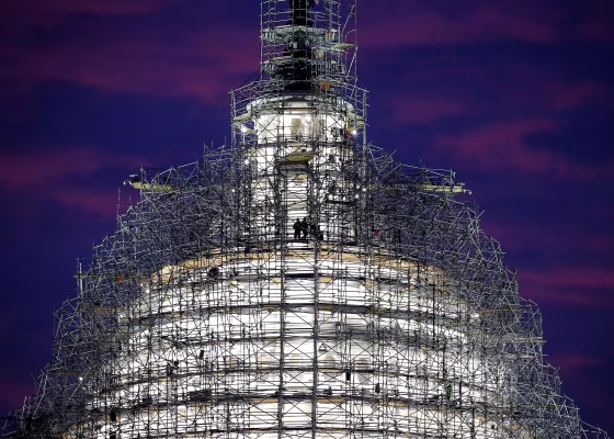 Image: Workers StandOn Scaffolding That Surrounds The Dome Of The US Capitol