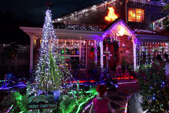 Image: Residents decorate their homes with lights