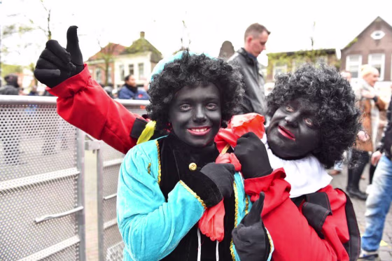 Family members young and old dressed as the controversial character Black Pete during a recent Sinterklaas parade.