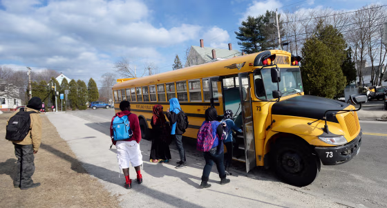 Image: High School students take a bus