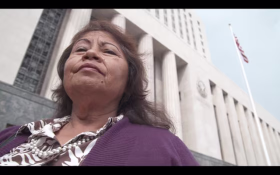 Plaintiff Maria Figueroa at the federal courthouse in downtown Los Angeles.