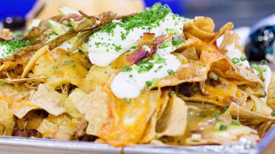 Adam Rappaport of Bon Apetit concocts five-part, 50-ingredient loaded Super Bowl nachos