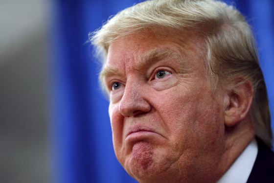 Image: File photo of U.S. Republican presidential candidate Trump answering a question at a news conference before a campaign rally in Hampton