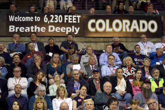 Image: Attendees at the Colorado Republican state convention listen to a speaker at the event in Colorado Springs