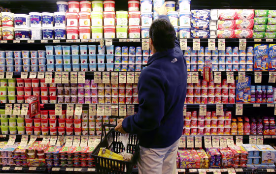 Image: A man shops in the yogurt aisle at a store in San Francisco