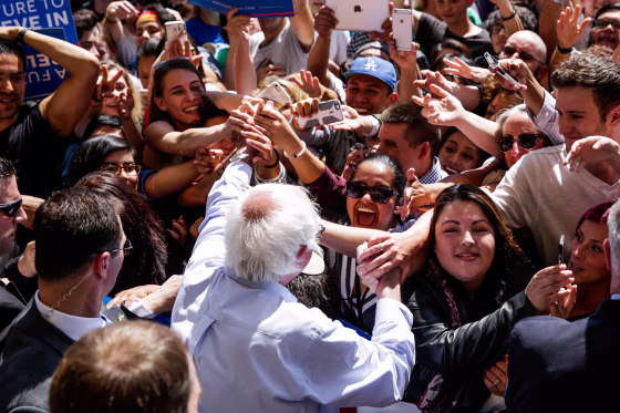Image: U.S. Democratic presidential candidate Bernie Sanders greets supporters at a campaign rally in Stockton