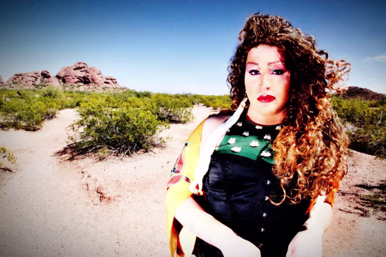 George Soctomah Neptune posing as his drag alter ego Lyzz Bien.