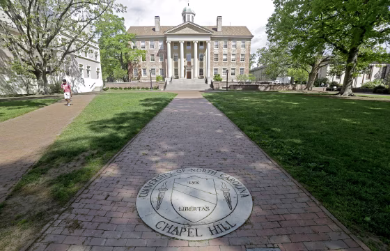 A sidewalk leads to the South Building on campus at The University of North Carolina in Chapel Hill, N.C.