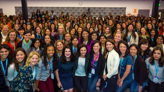 Facebook COO Sheryl Sandberg is at the center of a group photo at Facebook's Women in Product Conference in Menlo Park, California on September 13, 2016.  Conference co-founders Fidji Simo and Deb Liu are to her left and right.