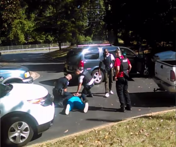Image: Video shows a man after he was shot by police in Charlotte, N.C.