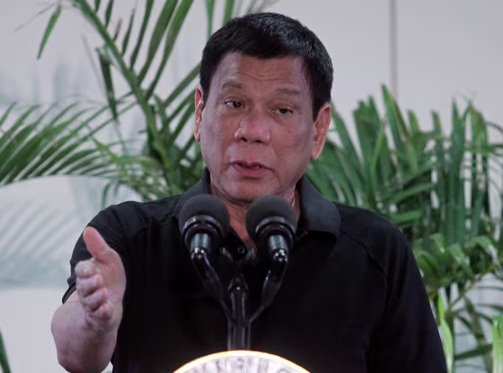 Image: Philippines President Rodrigo Duterte gestures during a news conference upon his arrival from Vietnam trip at the International Airport in Davao city