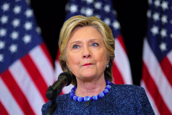 Image: U.S. Democratic presidential nominee Hillary Clinton holds an unscheduled news conference after a campaign rally in Des Moines