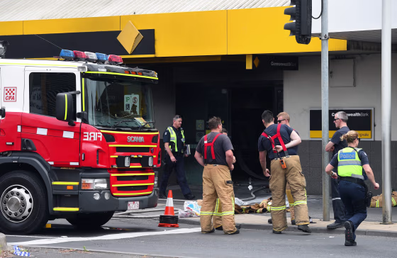 Image: Emergency crews after fire at a bank in Melbourne, Australia