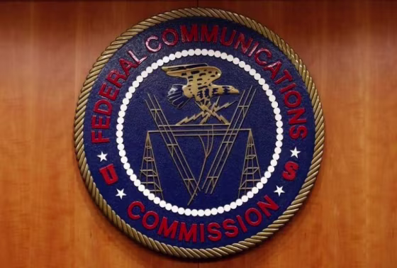 The Federal Communications Commission (FCC) logo is seen before the FCC Net Neutrality hearing in Washington