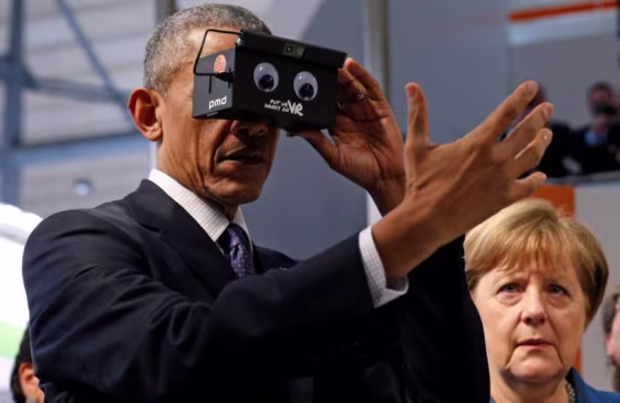 U.S. President Obama tries virtual reality glasses as he and German Chancellor Merkel tour Hanover Messe Trade Fair in Hanover