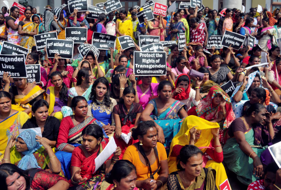 Image: Participants hold placards during a protest demanding an end to what they say is discrimination and violence against the transgender community, in Bengaluru