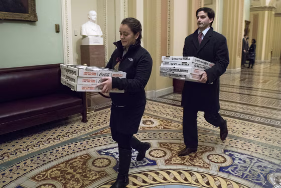 Image: US Senate works after hours on a series of votes on amendments to the budget bill before the Senate