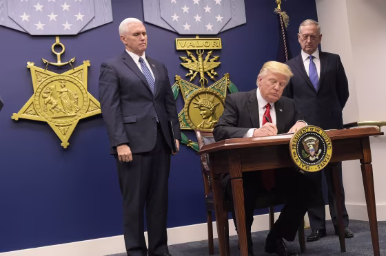 Image: President Trump signs an executive order alongside Defense Secretary Mattis and Vice President Pence on Jan. 27 at the Pentagon in Washington, D.C.