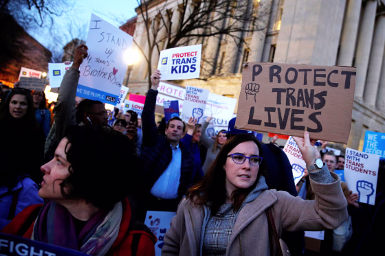 Image: Transgender activists and supporters protest near the White House in Washington