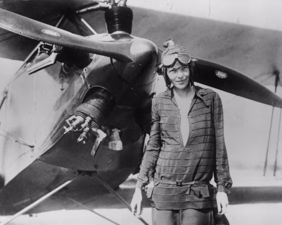 Image: Amelia Earhart stands June 14, 1928 in front of her bi-plane called \"Friendship\" in Newfoundland.